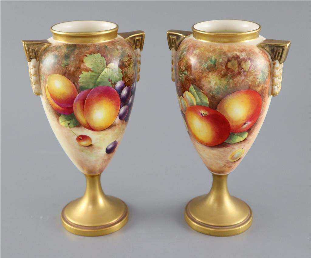 A pair of Royal Worcester fruit painted oviform vases, post-war, painted by J. Cook & P. Lynes, 21cm high